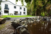 Garten - Luxuriöses Einfamilienhaus im Landhausstil mit Einliegerwohnung