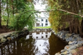 Biotop - Luxuriöses Einfamilienhaus im Landhausstil mit Einliegerwohnung